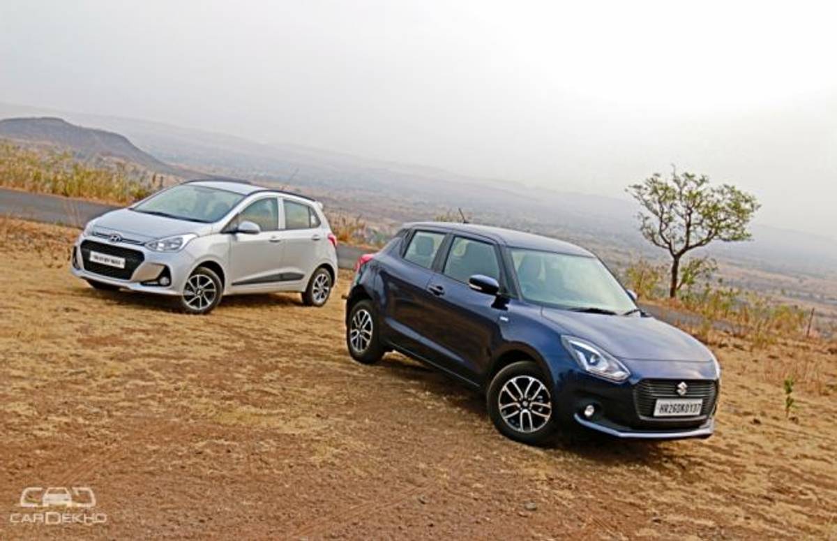 Maruti Swift Diesel vs Hyundai Grand i10 Diesel - Real-World Performance & Mileage Maruti Swift Diesel vs Hyundai Grand i10 Diesel - Real-World Performance & Mileage