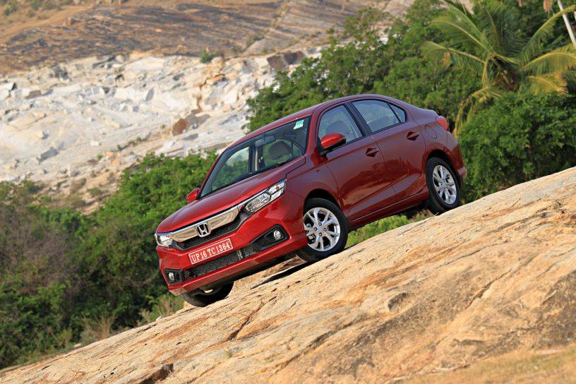 Clash Of Segments: Honda Amaze vs Maruti Baleno - Which Car To Buy?